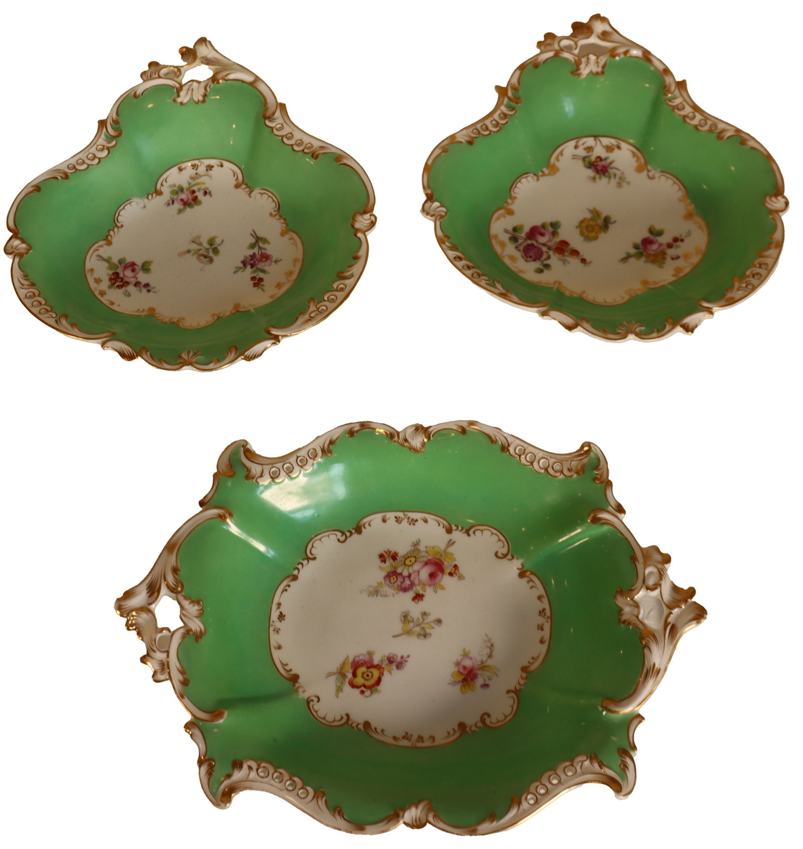 (3) Antique English Porcelain Platters or Dessert Trays: (3) Antique English Porcelain Platters or Dessert Trays. Two of the pieces are the same shell-like shape, while the third is larger and almost rectangular in shape with sharp points and curves on the 