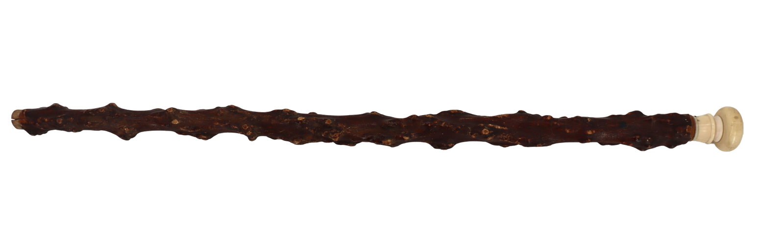 18th Century Irish Blackthorn Shillelagh Walking Stick: 18th Century Irish Blackthorn Shillelagh Walking Stick. Rustic, gnarled dark wood walking stick featuring a characteristically knobby natural shaft topped with a light-colored, turned handle. Size: 34