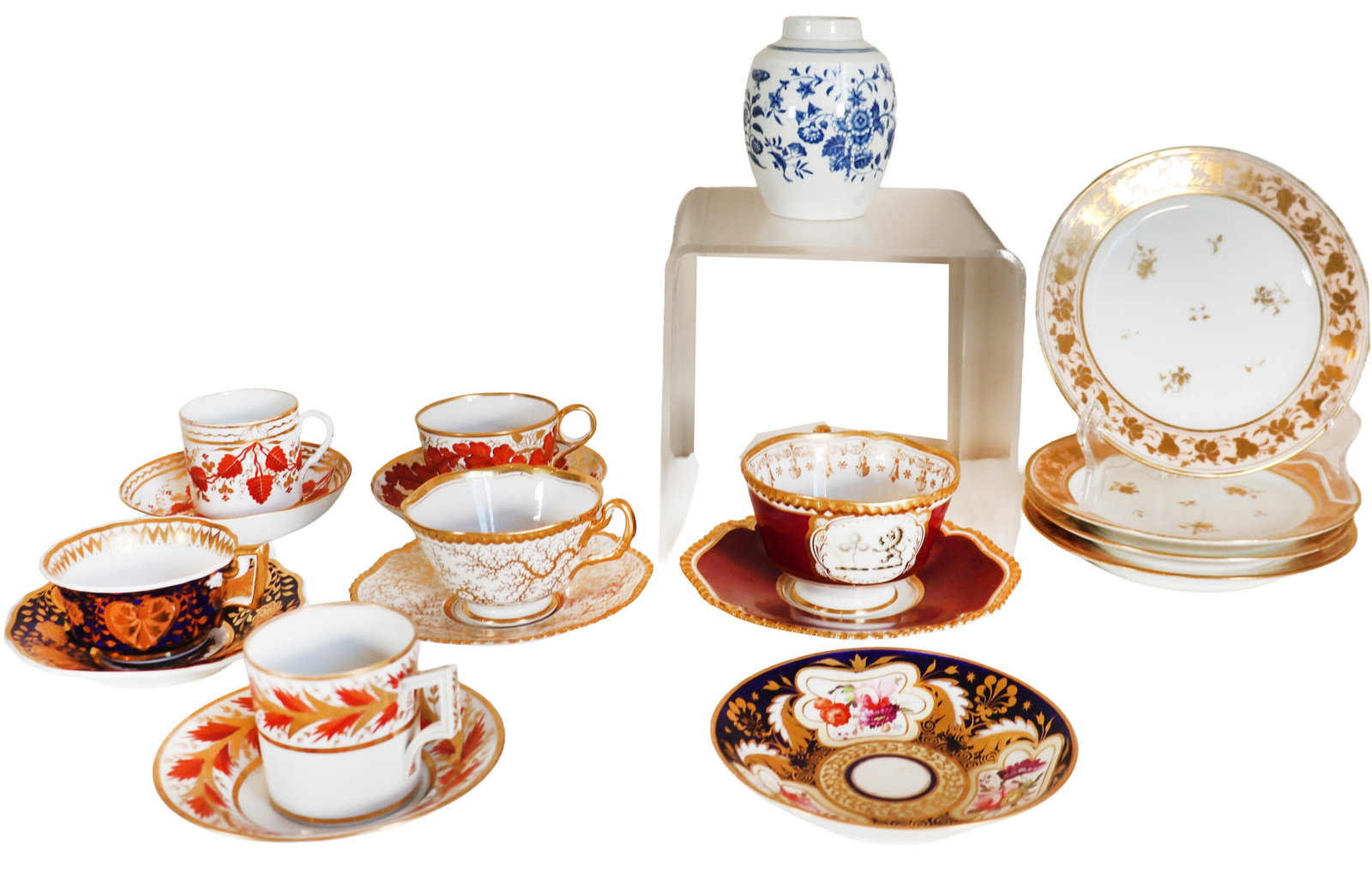 (18) Porcelain Cups, Saucers, and Plates by Various Manufacturers: (18) Porcelain Cups, Saucers, and Plates by Various Manufacturers. Assortment of various antique porcelain teaware and decorative pieces, including intricate gilded teacups with saucers in tradit