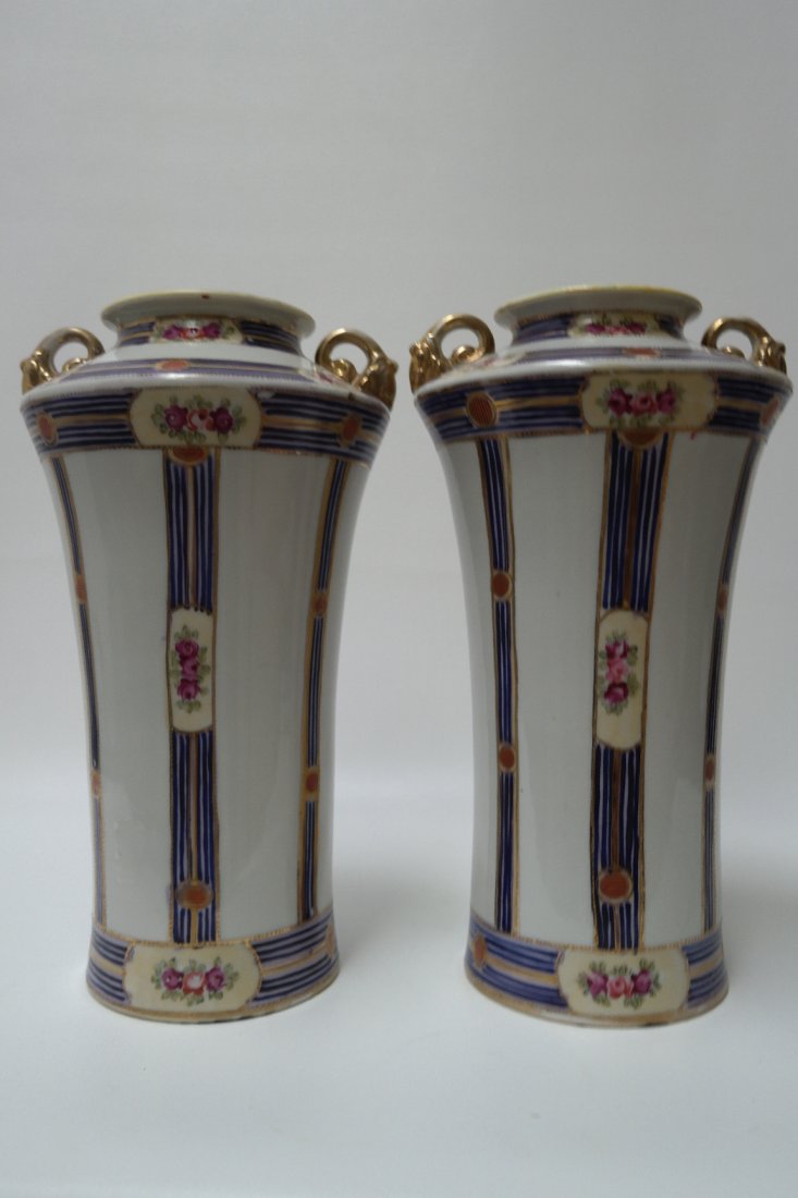 Pair of Large Imperial Hand Painted Nippon Vases: Pair of Monumental Imperial Hand Painted Nippon Vases. Marked "imperial Hand Painted Nippon" on bottom of each vase. Height:12.5 inches. Width: 8 inches.