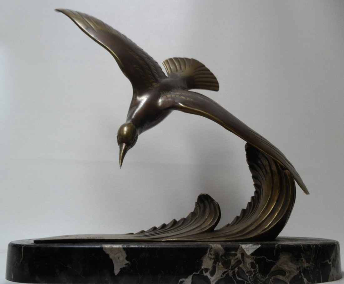 L. de Marco Art Deco Bronze Bird Mounted on marble base: L de Marco Art Deco Bronze Bird Mounted on marble base. On bottom part of bronze bird. Height: 21 inches.