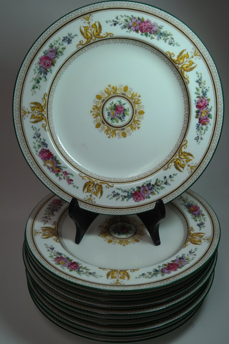 Set of 11 Wedgwood 1925 Columbia Pattern Lunch Plates: Set of 11 Wedgwood 1925 Columbia Pattern Lunch Plates. All plates marked on the Bottom. With a beautiful multi colored floral pattern. Diameter: 9 inches. Marked on Base.