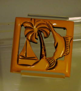 Yellow Bakelite Pin w/ marlin, sailboat & palm tree