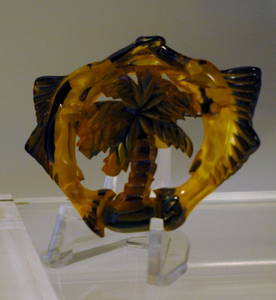 Carved Bakelite Pin w/ 2 Marlins over Palm Tree