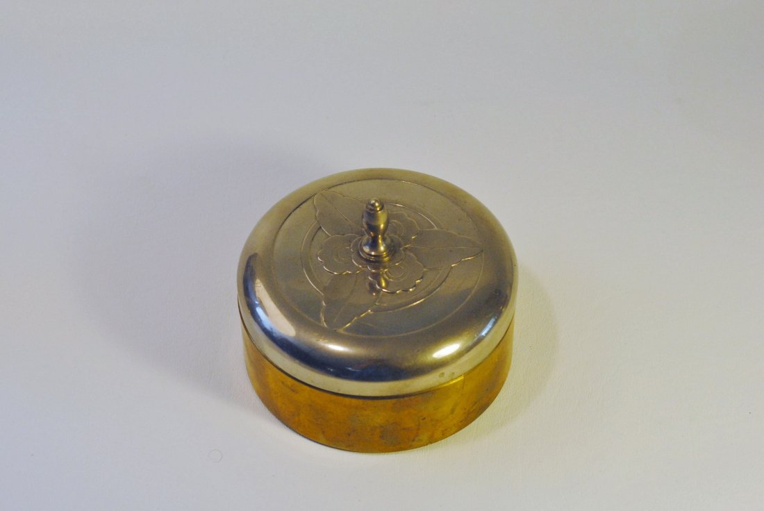 Chase Signed Container: Chase signed stainless steel container, with gilt bottom and glass liner. Stainless steel lid is decorated with engraved floral motif. Gilt bottom marked Chase. Bottom has minor splits on sides and ta