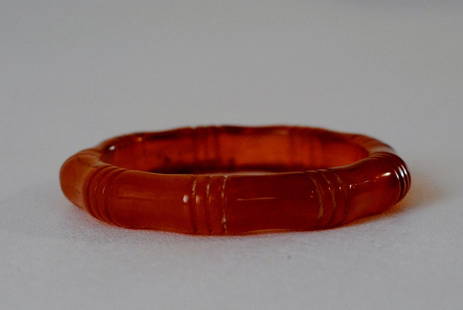 Translucent Amber Bakelite Bangle w/ Bamboo Motif: Translucent amber color bakelite bangle with carved bamboo motif, some white coloring to it