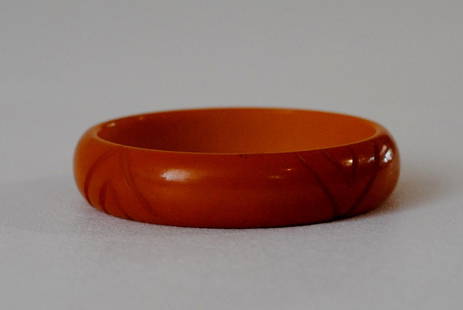 Amber Bakelite Bangle w/ Triangular Etchings: Amber colored bakelite bangle with etchings in a triangular shape