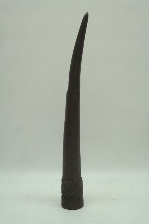Antique African Bronze Piece: Bronze piece having circular motif at base.
