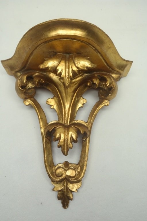 Italian Antique Gilt Wall Sconce: Antique gilt wall sconce having floral motif.