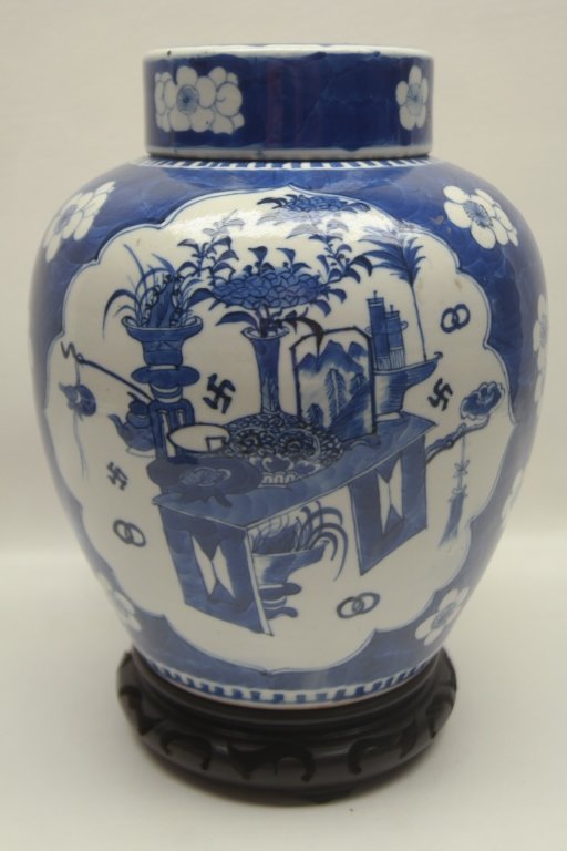 17th C. Kang Hsi Dyn Blue/White Porcelain Ginger Jar: Antique blue and white porcelain ginger jar having Hawthorn pattern. Also having imagery of set table and Buddhist swastikas. Base is marked. Height: 10.5 in