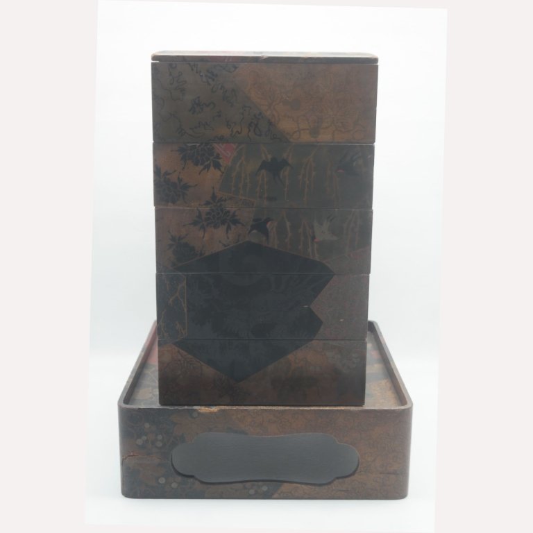 Antique Japanese Stacking Trays: Antique stacking trays with table and having stylized floral and avian motifs.