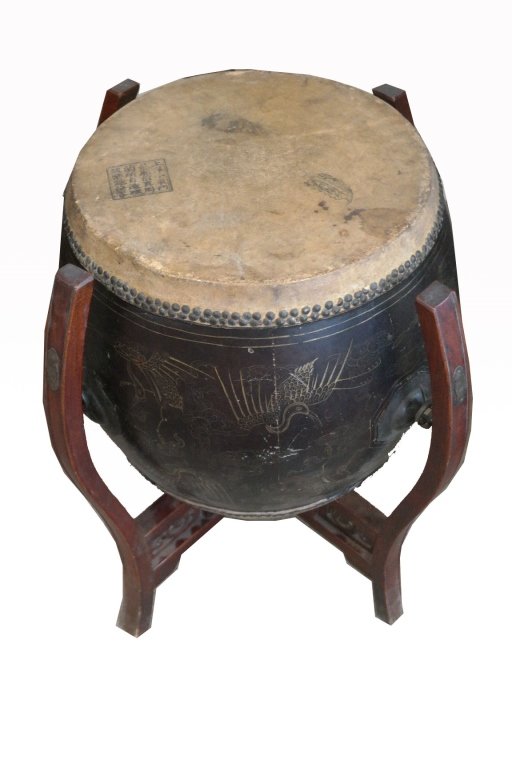 Antique Mongolian Drum: Antique Mongolian drum having animal hide and a wooden stand. Drum having black painted body with gilt painted images of stylized cranes and clouds. Top of having two sets of calligraphy signatures. P