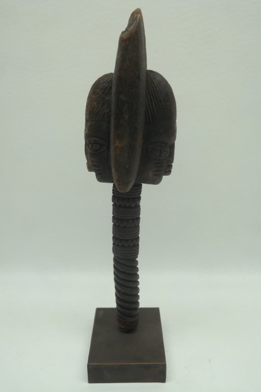 Antique Yoruba Shango Dance Staff: Antique Yoruba Shango Dance Staff in wood construction. Having carved facial depiction and geometric motifs to shaft.