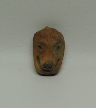 Pre-Columbian earthenware animal head effigy: Pre-Columbian earthenware animal head effigy Size: H 2.25 in