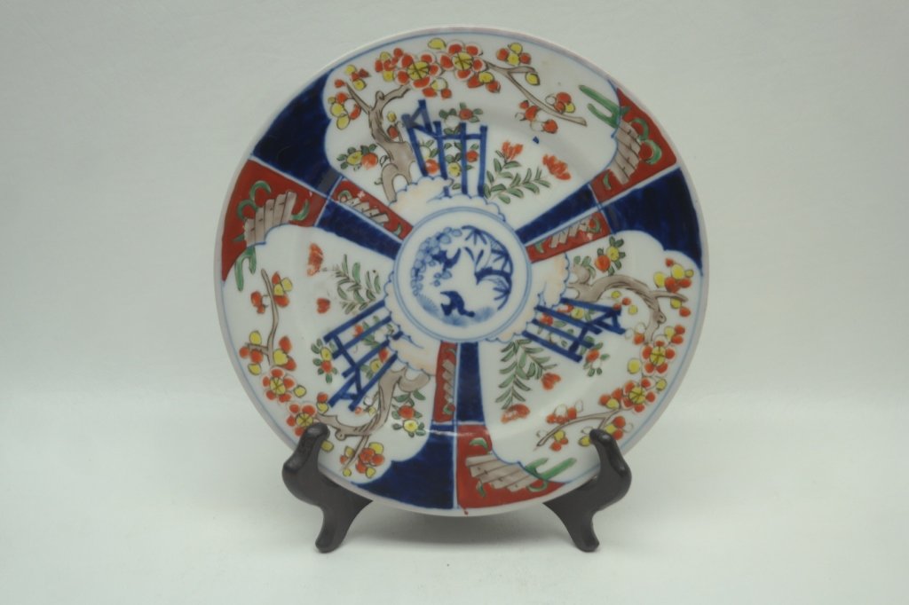 Antique Imari Porcelain Plate: Antique Imari porcelain plate having stylized fruit tree motif.