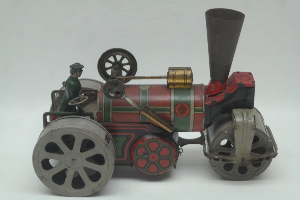 20th C. Orbor Company Steam Roller: Rare circa 1930s German made steam roller by the Orbor company. Smoke stack may be reproduction. Toy is in working order.
