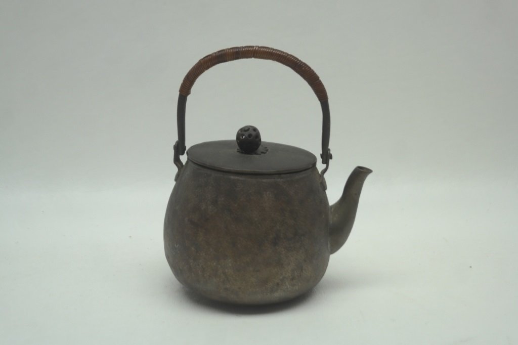 Antique Miniature Chinese Teapot: Antique miniature Chinese teapot in metal construction. Size: H: 4.25 in
