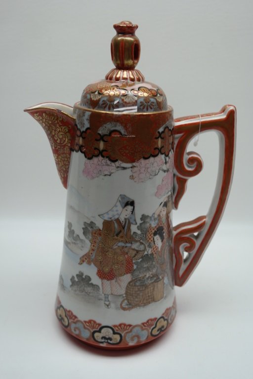 Antique Japanese kutani Pitcher: Antique kutani Pitcher. Having one chip on the rim (pictured). Height: 12 inches.