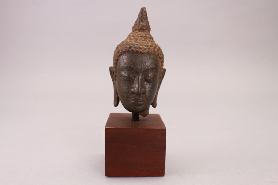 Early Antique Thai Bronze Bust: Early Antique Thai Bronze Bust on stand. Possibly 13-14th Century. Height: 4.75 in.