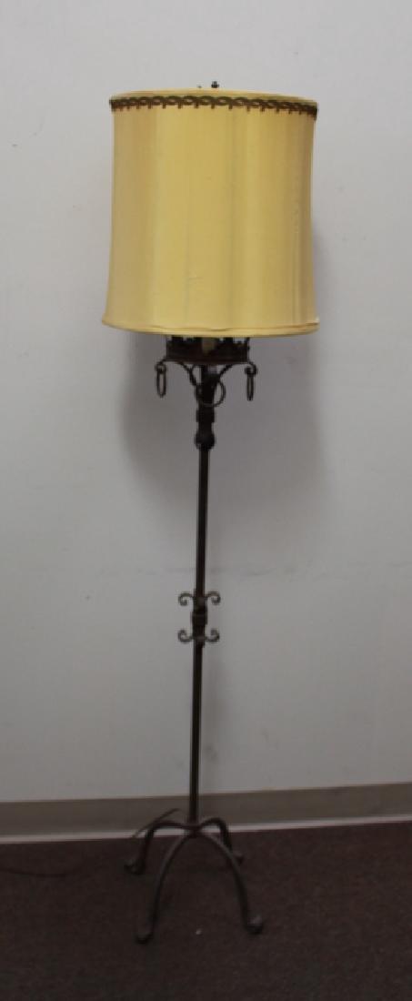 Wrought Iron Torchierre Floor Lamp: Height: 63.25 in. All clocks/lamps are sold for display purposes only. We cannot guarantee working order after item leaves premises.