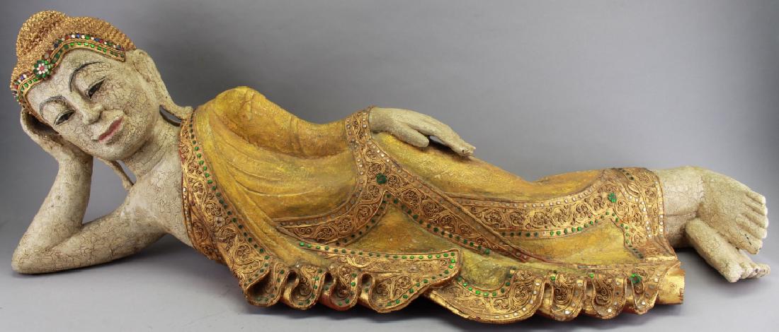 20th C. Thai Carved Reclining Buddha: 20th C. Thai Carved Reclining Buddha. With green/blue/red/ mirrored decoration throughout. Dimensions: