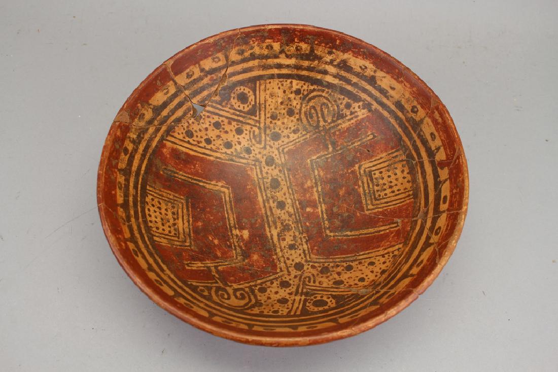 Pre Columbian Painted Earthenware Dish (as is): Pre Columbian Painted Earthenware Dish (as is). With remnants of original red/black paint remaining throughout. Restoration/damage near rim. Diameter: 10.25 in.