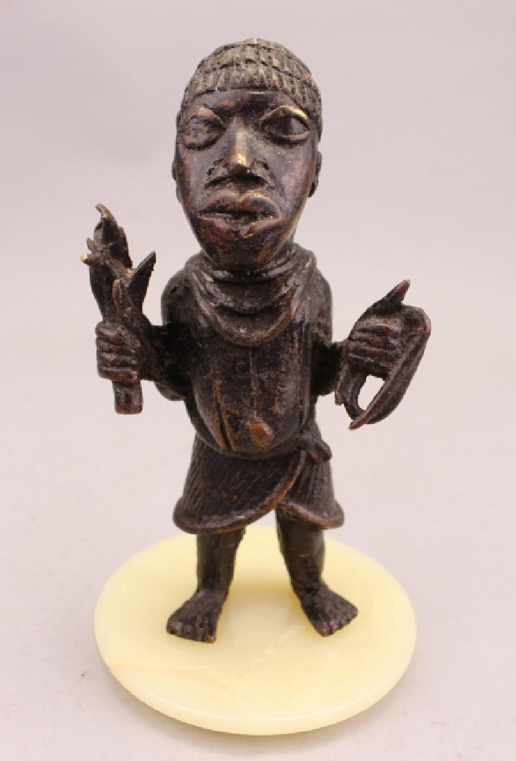 Antique Bronze African Figure on Onyx Base: (2) Carved African Headrests. Height: 6.75 in.