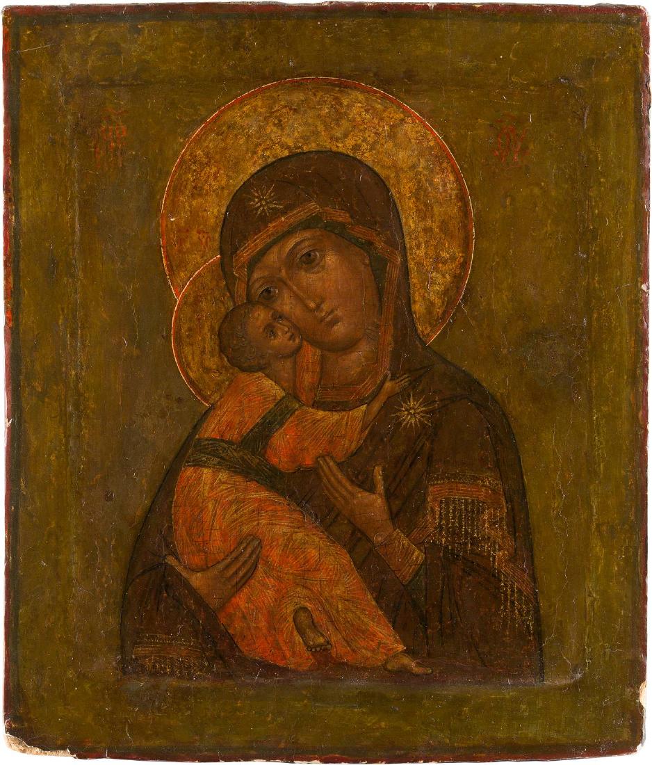 AN ICON SHOWING THE MOTHER OF GOD OF VLADIMIR Russian,: AN ICON SHOWING THE MOTHER OF GOD OF VLADIMIR Russian, 18th century Tempera on wood panel with kovcheg. Tenderly supporting Christ while looking towards the viewer with almond shaped eyes, her deep re