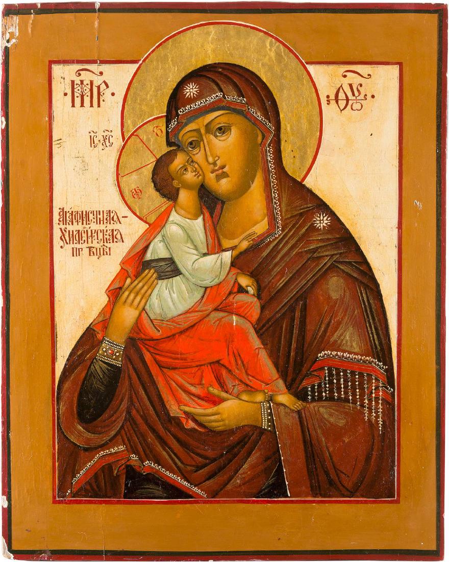A RARE AND LARGE ICON SHOWING THE AKAFISTNAYA: A RARE AND LARGE ICON SHOWING THE AKAFISTNAYA KHILENDARSKAYA MOTHER OF GOD Russian, after 1837 Tempera on wood panel. The haloes gilded. This is one of the famous Mount Athos icons from the Khilandari