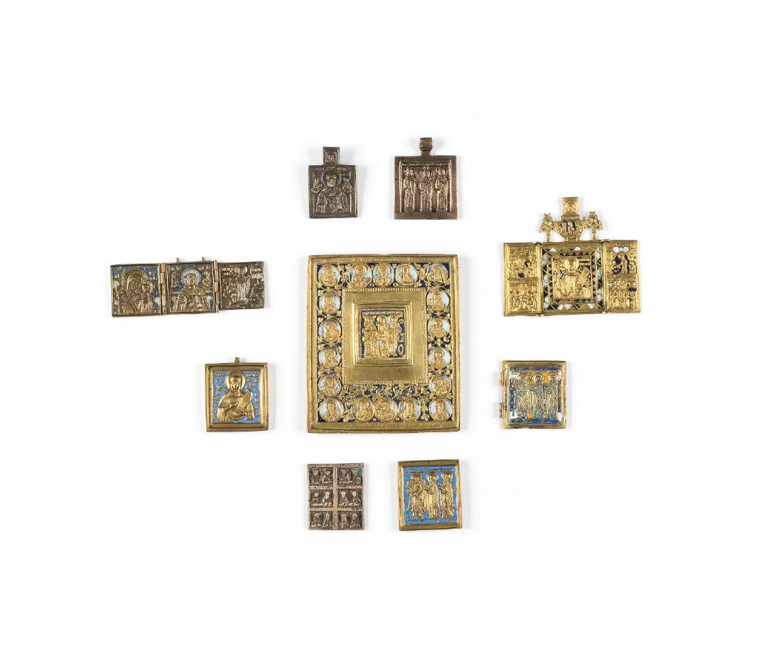A COLLECTION OF NINE BRASS ICONS SHOWING SELECTED (1 of 1)