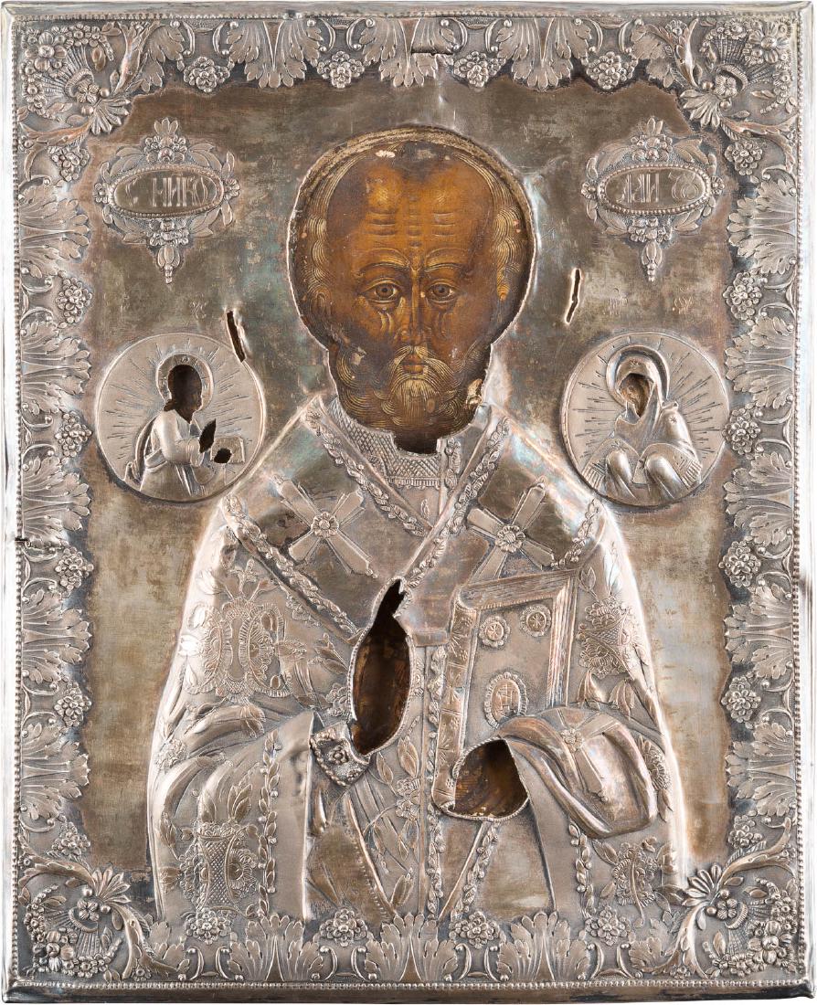 AN ICON SHOWING ST. NICHOLAS THE MIRACLE WORKER WITH A: AN ICON SHOWING ST. NICHOLAS THE MIRACLE WORKER WITH A SILVER OKLAD Russian, circa 1800 (icon), Russian, Moscow, 1833 (oklad) Tempera on wood panel with velvet backing. Executed on a gold ground. Over