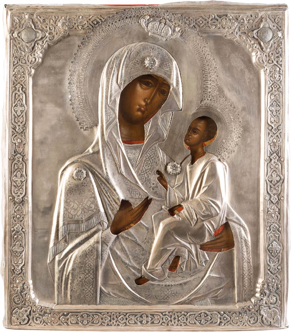 A LARGE ICON SHOWING THE TIKHVINSKAYA MOTHER OF GOD: A LARGE ICON SHOWING THE TIKHVINSKAYA MOTHER OF GOD WITH SILVER OKLAD Russian, 19th century (icon), Russian, St. Petersburg, Petr Ivanovitch Ivanov, 1879 (oklad) Tempera on wood panel with kovcheg. Th