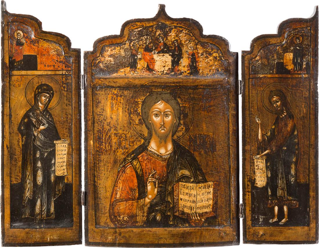 A LARGE TRIPTYCH SHOWING CHRIST FLANKED BY THE MOTHER: A LARGE TRIPTYCH SHOWING CHRIST FLANKED BY THE MOTHER OF GOD AND ST. JOHN THE FORERUNNER Russian, 17th century Tempera on wood panels with kovcheg. Minimally restored. 44.4 x 58.4 cm.GROSSES TRIPTYCHO