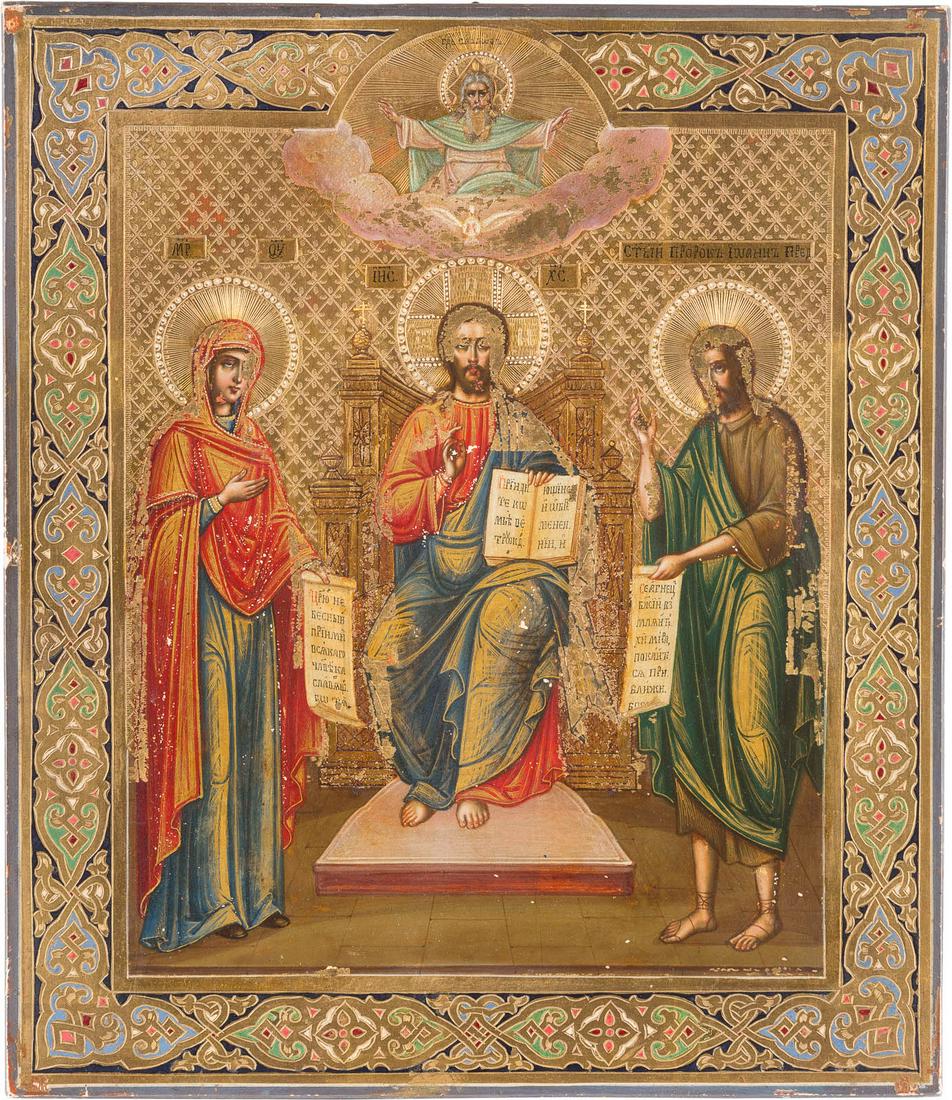 AN ICON SHOWING THE DEISIS Russian, circa 1900 Tempera: AN ICON SHOWING THE DEISIS Russian, circa 1900 Tempera on wood panel. Against a gold tooled background, the patterns the borders emulating contemporary metal oklads. Losses. 31 x 26.6 cm. IKONE MIT DE