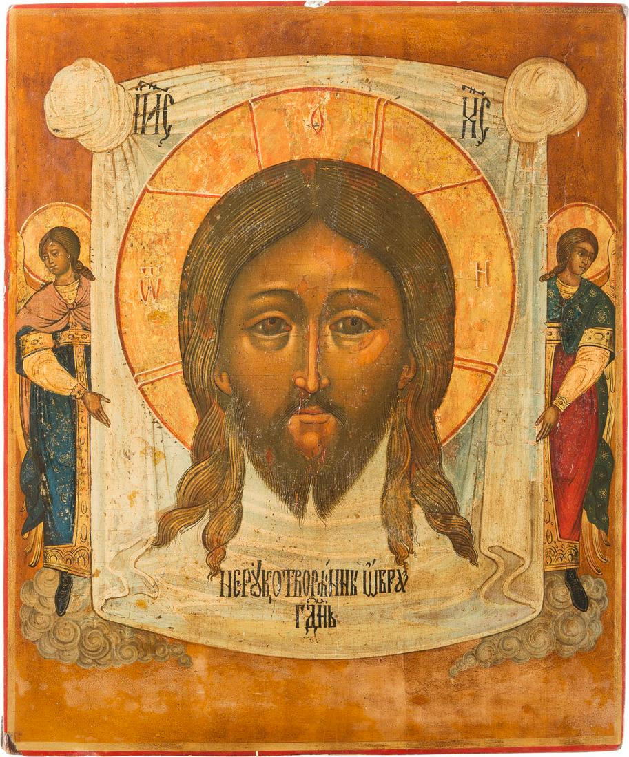 AN ICON SHOWING THE MANDYLION Russian, 18th century: AN ICON SHOWING THE MANDYLION Russian, 18th century Tempera on wood panel. The haloes gilded. Minor paint blisterings, minimally restored. 34 x 28.8 cm. IKONE MIT DEM MANDYLION Russland, 18. Jh. Holzt