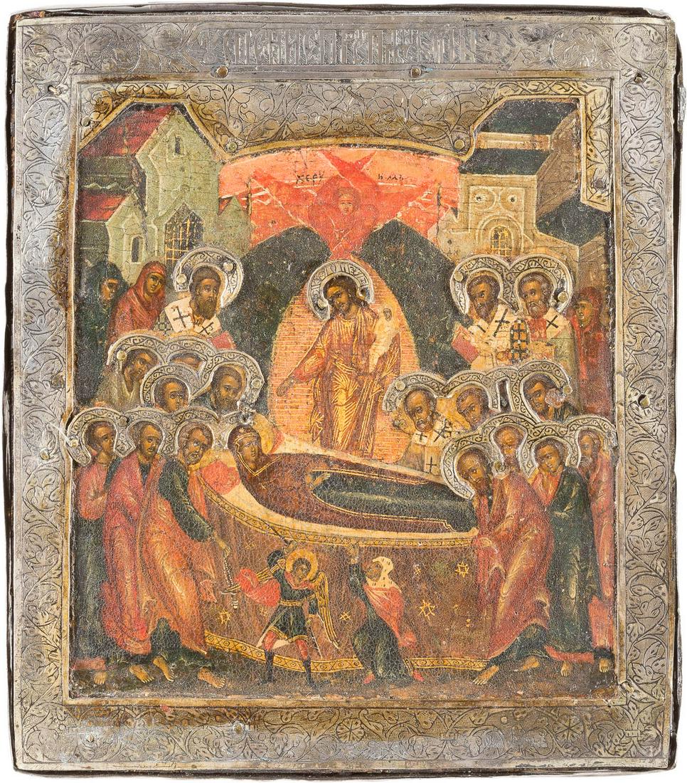 A SMALL ICON SHOWING THE DORMITION OF THE MOTHER OF GOD: A SMALL ICON SHOWING THE DORMITION OF THE MOTHER OF GOD WITH A SILVER BASMA Russian, circa 1600 Tempera on wood panel. The border overlaid with a finely engraved silver basma. Minimally restored. 17.6
