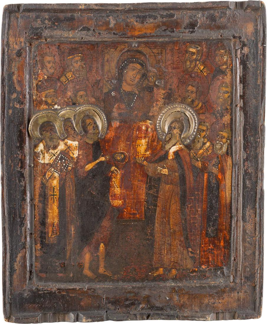 AN ICON SHOWING SELECTED SAINTS AND THE MOTHER OF GOD: AN ICON SHOWING SELECTED SAINTS AND THE MOTHER OF GOD OF KAZAN Russian, 17th century Tempera on wood panel with double kovcheg. Applied brass haloes. Losses, damages, restorations. 30.7 x 25.5 cm. PAT