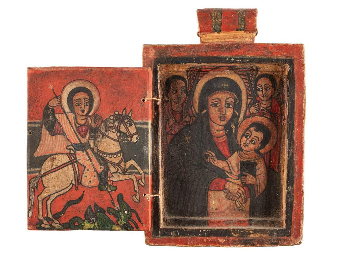 A COPTIC DOUBLE-SIDED DIPTYCH SHOWING THE MOTHER OF: A COPTIC DOUBLE-SIDED DIPTYCH SHOWING THE MOTHER OF GOD, ST. GEORGE, CHRIST AND THE CRUCIFIXION Ethiopian, 18th century Tempera on wood panels. Minimally worn. 15.5 x 10.4 cm (closed).DOPPELSEITIGES K