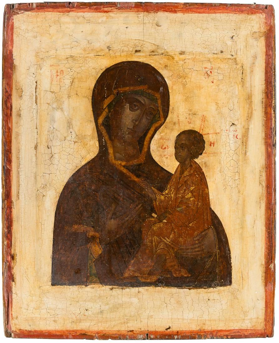 AN ICON SHOWING THE TIKHVINSKAYA MOTHER OF GOD Russian,: AN ICON SHOWING THE TIKHVINSKAYA MOTHER OF GOD Russian, 17th century Tempera on wood panel with double kovcheg. The garments with gold folds. The background and border stripped to gesso, areas of rest