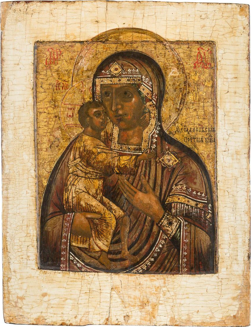 A LARGE ICON SHOWING THE FEODOROVSKAYA MOTHER OF GOD: A LARGE ICON SHOWING THE FEODOROVSKAYA MOTHER OF GOD Russian, circa 1700 Tempera on wood panel with kovcheg. Executed on a gold ground. Partially restored, the border stripped to gesso, the backside c