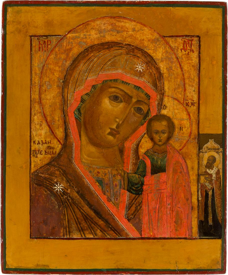 AN ICON SHOWING THE KAZANSKAYA MOTHER OF GOD Russian,: AN ICON SHOWING THE KAZANSKAYA MOTHER OF GOD Russian, circa 1800 Tempera on wood panel. On the right border appearing a saint in bishop's attire. The background and border stripped to gesso, restored.