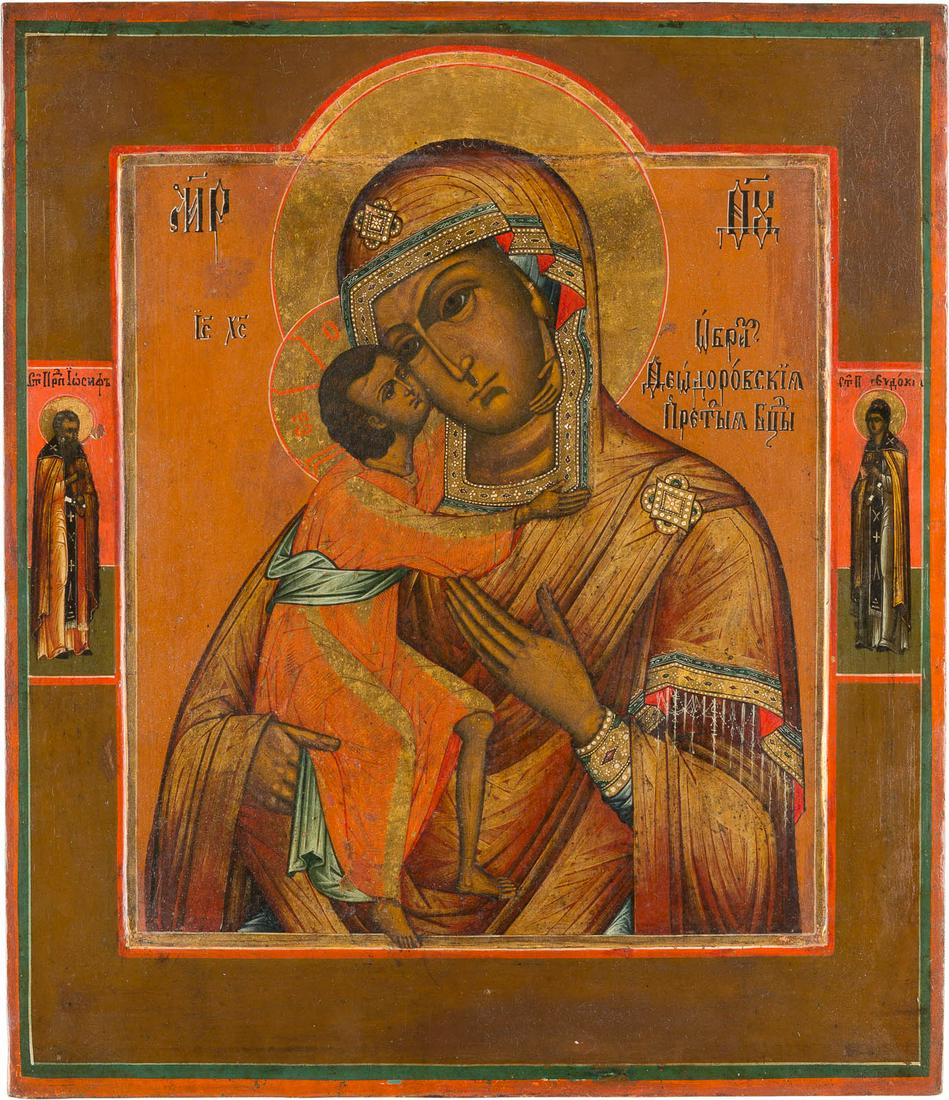 AN ICON SHOWING THE FEODOROVSKAYA MOTHER OF GOD: AN ICON SHOWING THE FEODOROVSKAYA MOTHER OF GOD Russian, 19th century Tempera on wood panel with kovcheg. The haloes and the folds of the garments gilded. Two selected saints on the borders. Minimally