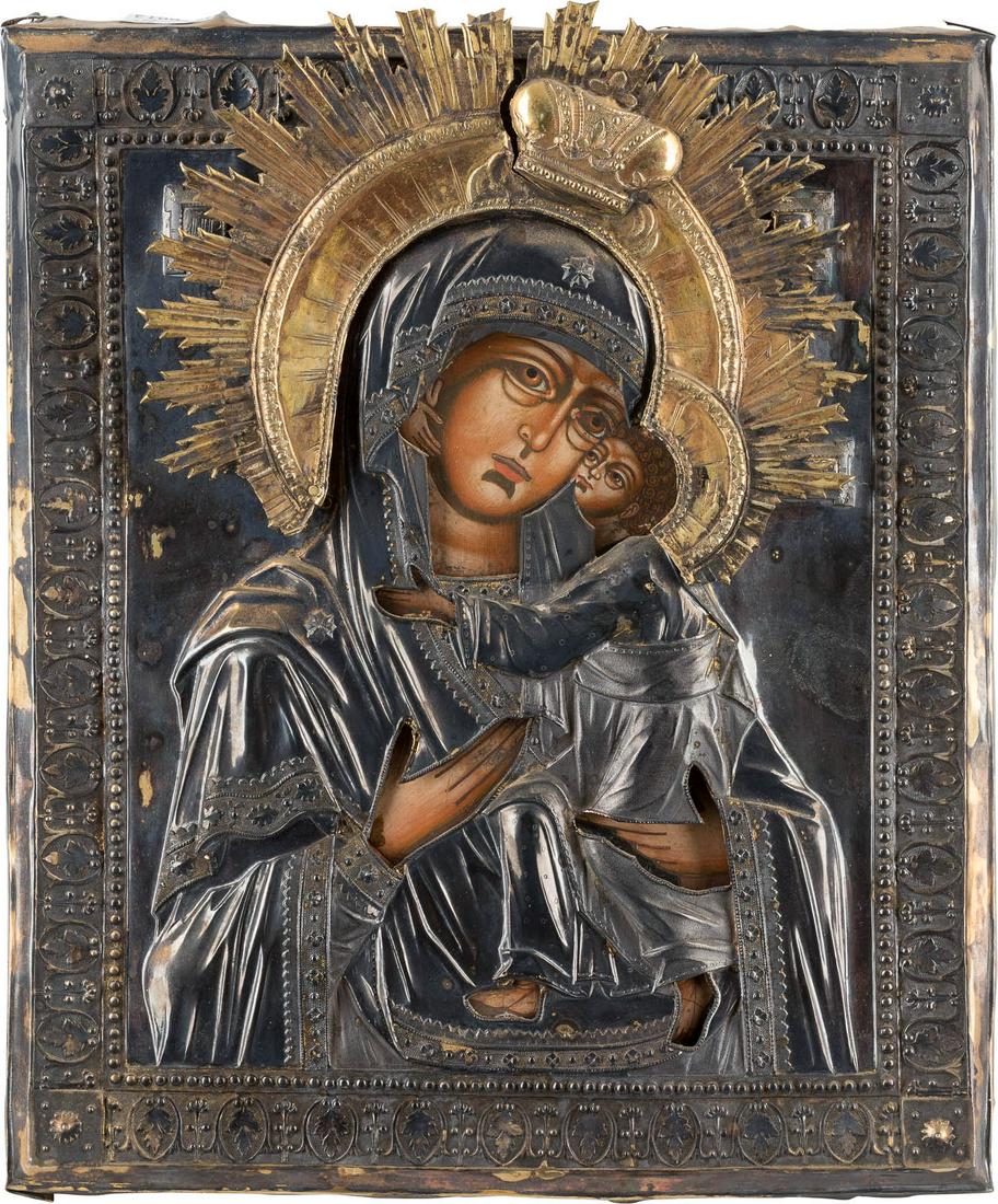 AN ICON SHOWING THE TOLGSKAYA MOTHER OF GOD WITH A: AN ICON SHOWING THE TOLGSKAYA MOTHER OF GOD WITH A SILVER-GILT OKLAD Russian, St. Petersburg, 1817 (oklad) Tempera on wood panel. Executed on a gold ground. Overlaid with a chased and embossed silver-