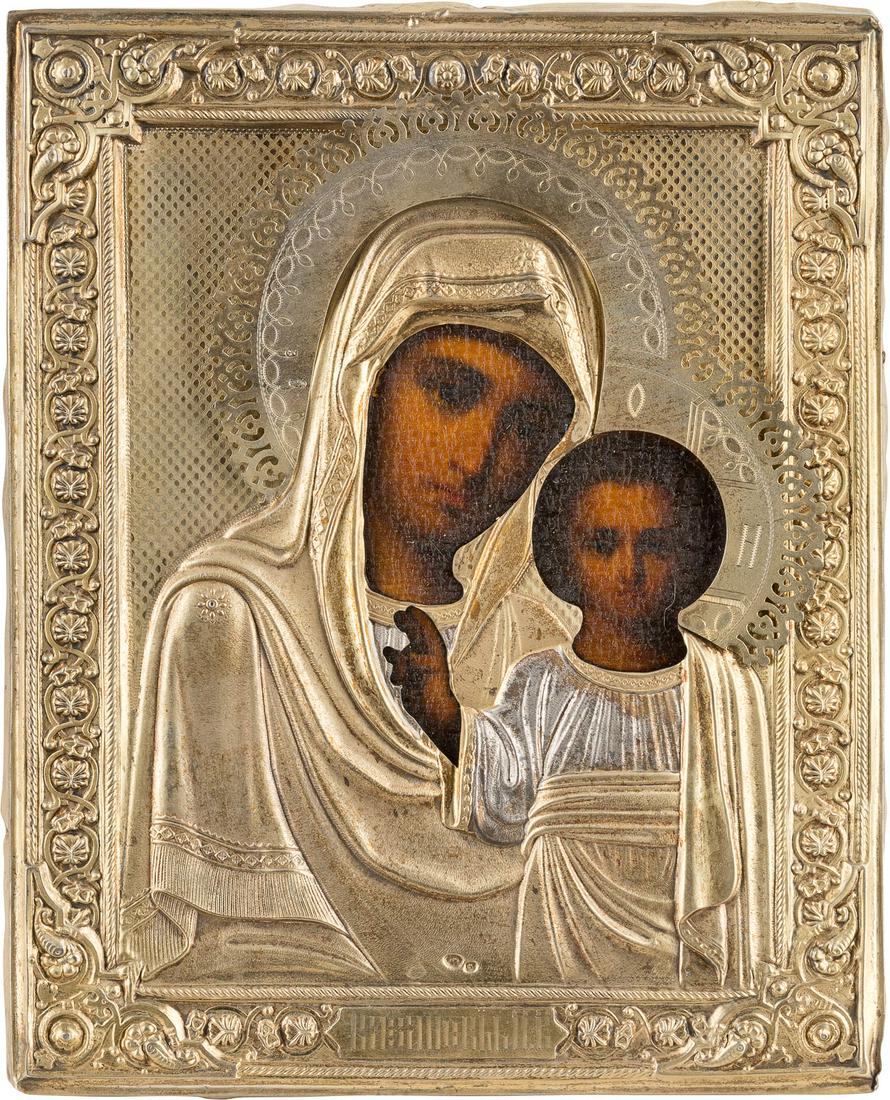 A SMALL ICON SHOWING THE KAZANSKAYA MOTHER OF GOD WITH: A SMALL ICON SHOWING THE KAZANSKAYA MOTHER OF GOD WITH A SILVER-GILT OKLAD Russian, late 19th century (icon), Russian, Moscow, Semen Galkin, 1896-1908 (oklad) Oil on wood panel with velvet backing. Ov