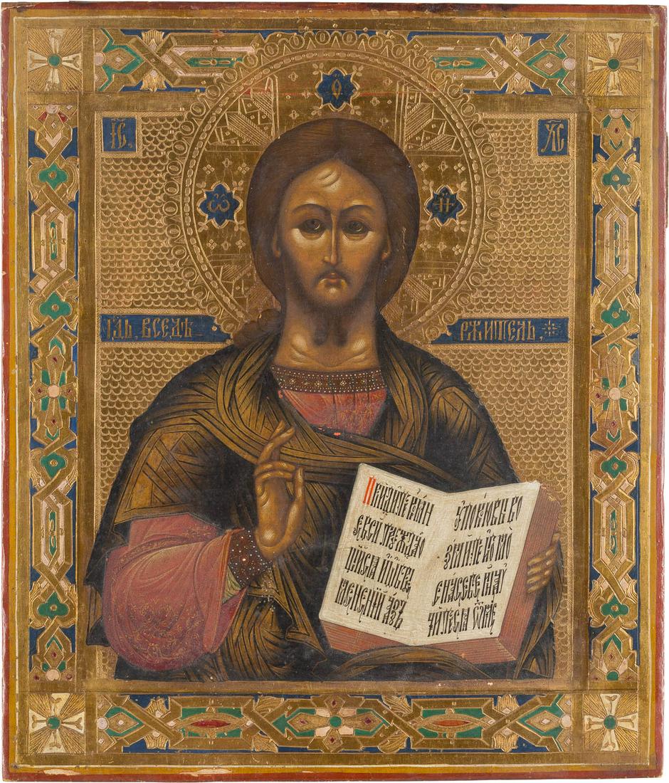 AN ICON SHOWING CHRIST PANTOKRATOR Russian, late 19th: AN ICON SHOWING CHRIST PANTOKRATOR Russian, late 19th century Tempera on wood panel with kovcheg. The background with etched tracery design, the border emulating contemporary enamelwork. 31.2 x 26.8 c