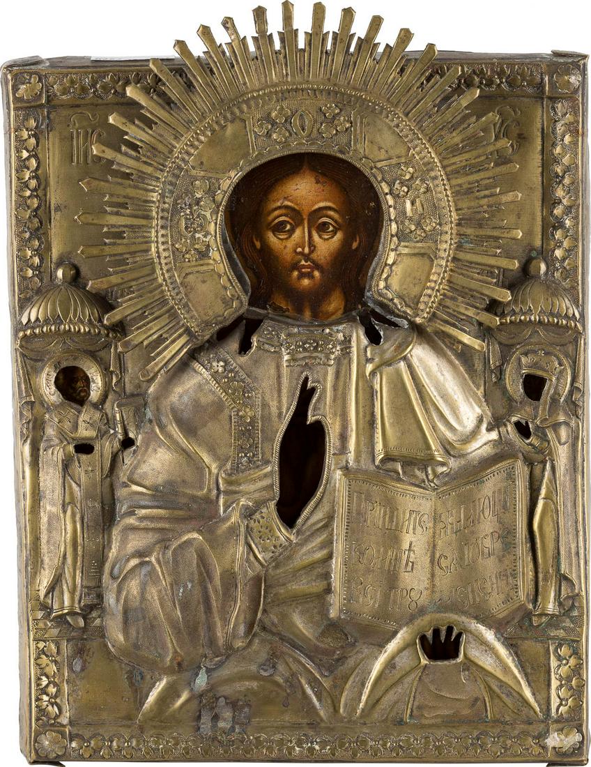A SMALL ICON SHOWING CHRIST PANTOKRATOR WITH OKLAD: A SMALL ICON SHOWING CHRIST PANTOKRATOR WITH OKLAD Russian, early 19th century (icon), Russian, circa 1820 (oklad) Tempera on wood panel. Two selected saints on the borders: Sts. Nicholas of Myra and 