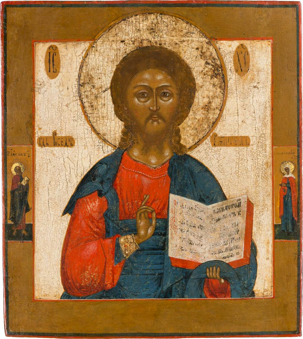 AN ICON SHOWING CHRIST PANTOKRATOR Russian, late 18th: AN ICON SHOWING CHRIST PANTOKRATOR Russian, late 18th century Tempera on wood panel with kovcheg. The haloes gilded. Two selected saints on the borders. The background stripped to gesso, minimally res