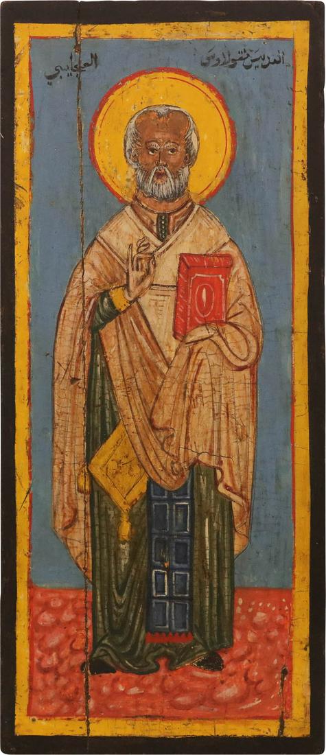 A LARGE MELKITE ICON SHOWING ST. NICHOLAS OF MYRA: A LARGE MELKITE ICON SHOWING ST. NICHOLAS OF MYRA Syrian school, 18th century Tempera on wood panel. Vertical crack, minimally restored. 45.3 x 19.5 cm. Ethnologie-Museum in Rotterdam vom 29. November