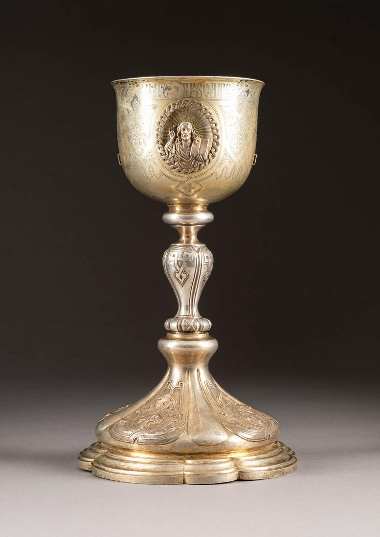 A LARGE SILVER-GILT CHALICE Russian, Moscow, 1867 The: A LARGE SILVER-GILT CHALICE Russian, Moscow, 1867 The body set with plaques, some are missing. Marked with city hallmark, assayer's mark, 84 standard and various master's marks. 30.8 cm high, 661 gr.G