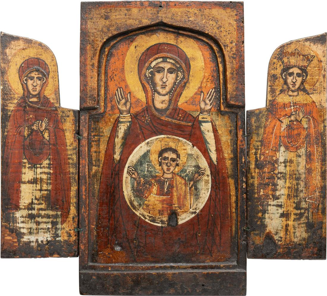 A TRIPTYCH SHOWING THE MOTHER OF GOD OF THE SIGN AND: A TRIPTYCH SHOWING THE MOTHER OF GOD OF THE SIGN AND STS. PARASKEVA AND CATHERINE Bulgarian, 18th century Tempera on wood panels. Minor losses. 33.7 x 36.7 cm (extended).TRIPTYCHON MIT DER GOTTESMUTTE